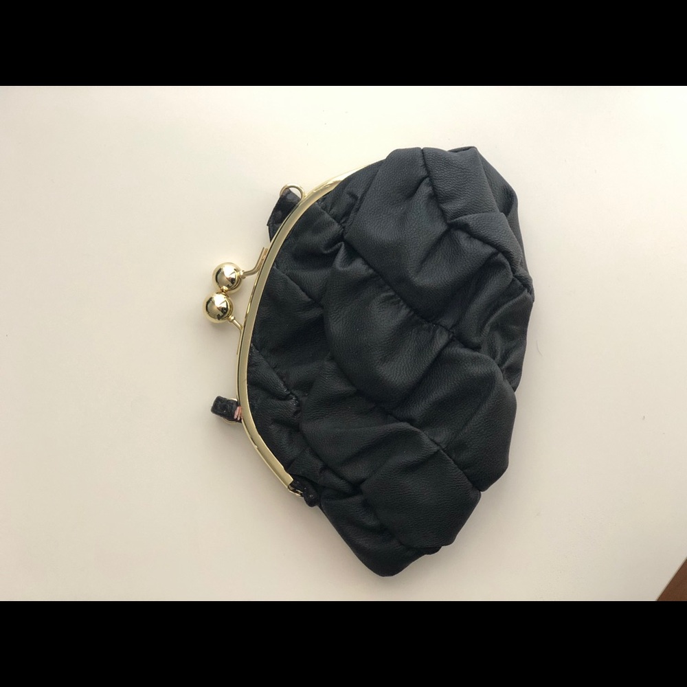 Black clutch with gold hardware